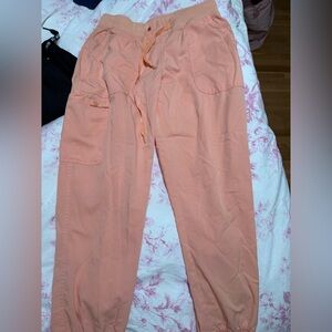 Peach/light orange scrub pants